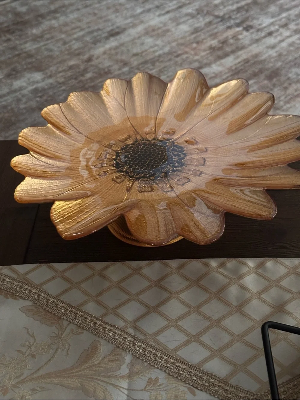 Gold sunflower glass decorative plate on a pedestal stand